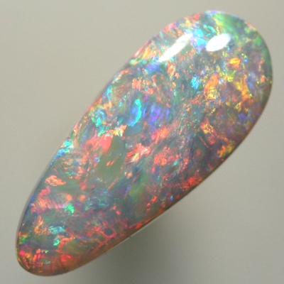 SOLID SEMI BLACK OPAL  Sparkling 3D pattern with reds, orange and green turquoise. SEE VIDEO
